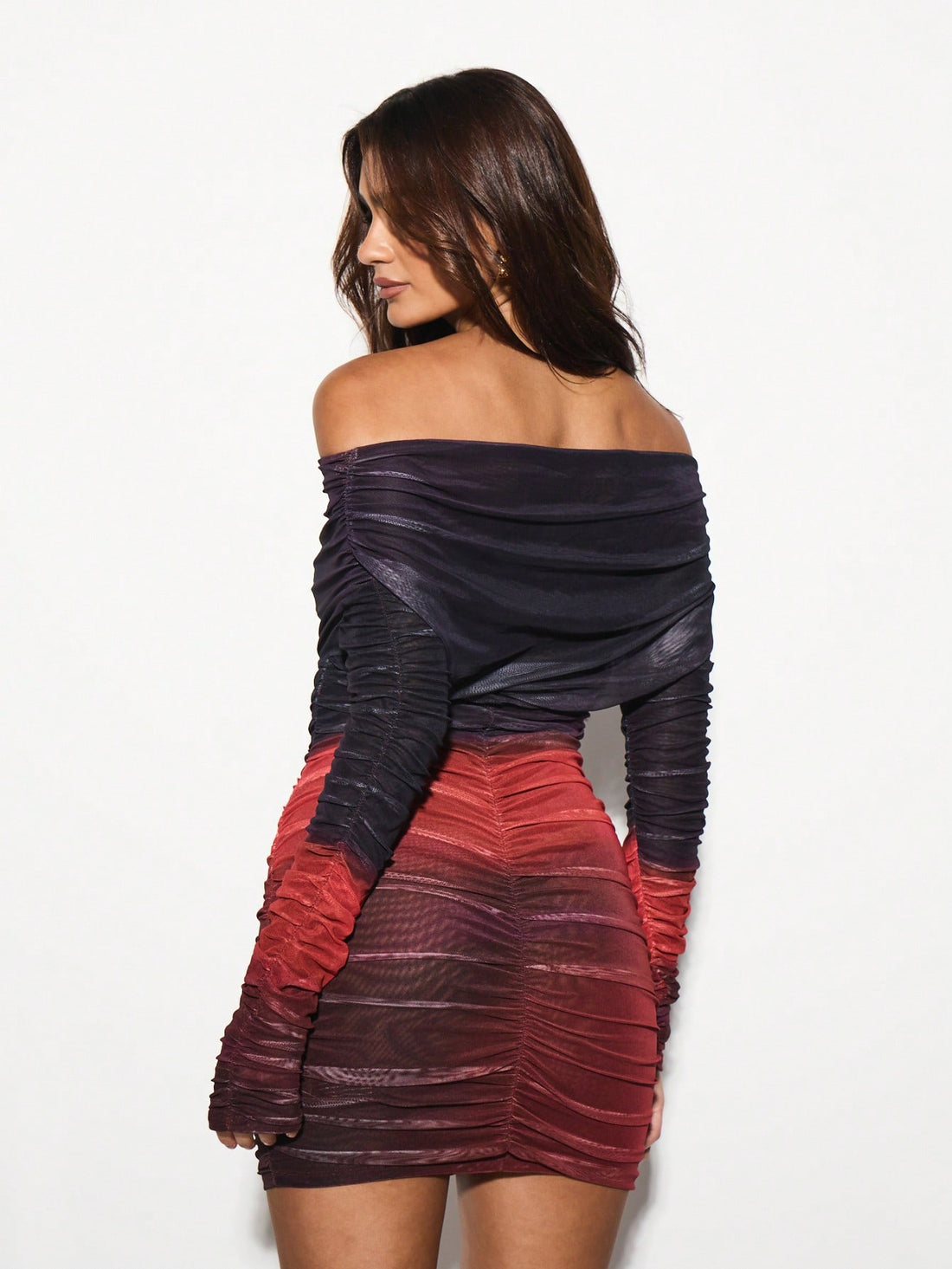 Turn heads at your next night out in this stunning off-shoulder mini dress that's equal parts sultry and fun. The ruched detailing hugs your curves in all the right ways, while the sheer mesh overlay adds an edgy, modern twist that screams confidence. Perfect for parties, club nights, or anywhere you want to make a statement. Slip it on, own the room, and let your style do the talking.