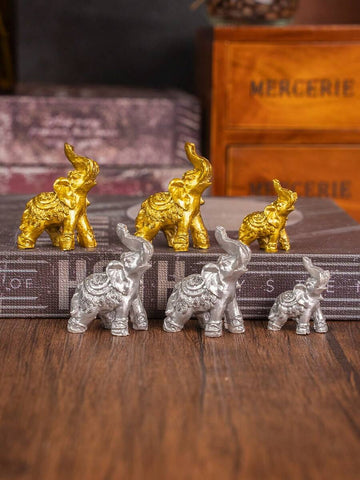 Mini golden elephant decor set in gold finish for gift display
