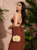 Elegant woven clutch purse for warm-weather celebrations