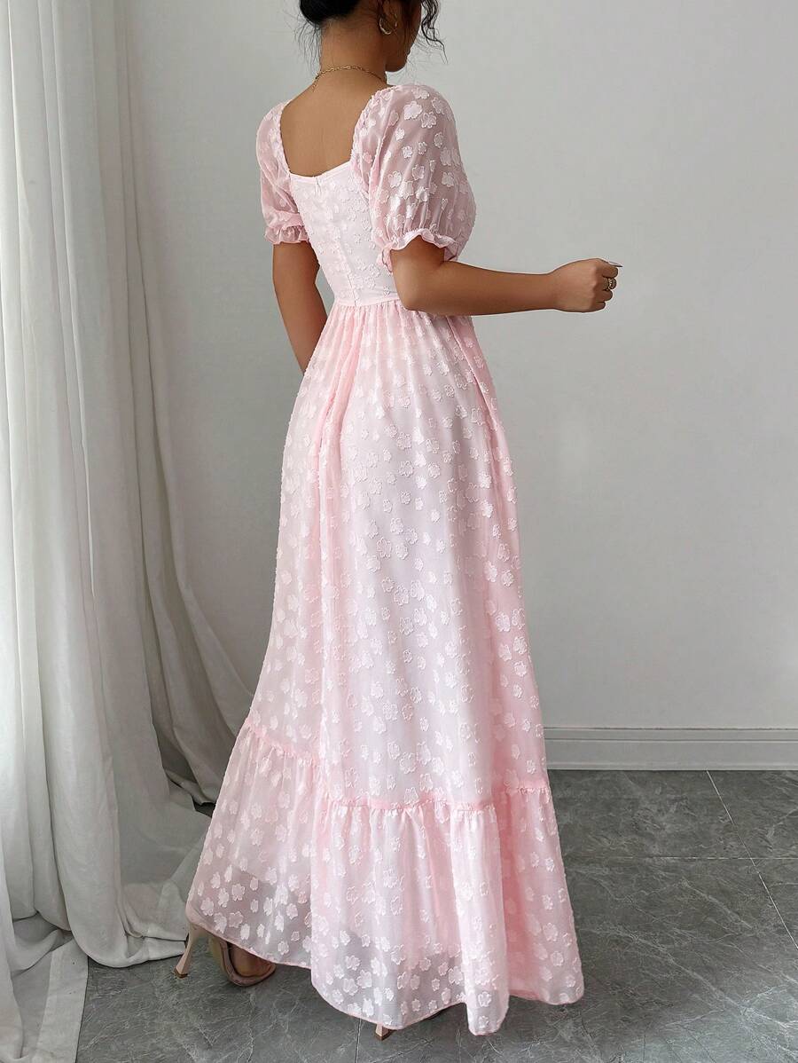 Full front view of light pink A-line maxi dress with ruffle hem and floral pattern