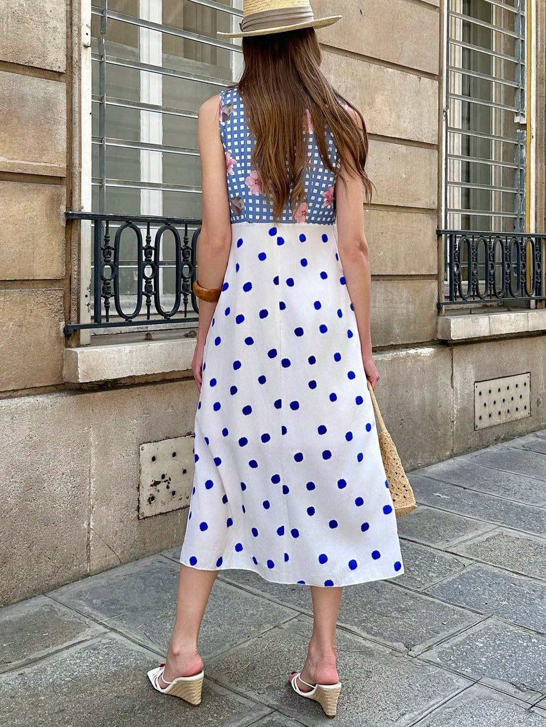 Make a statement in our V-Neck Sleeveless Two-Tone Polka Dot Midi Dress! This playful number combines classic polka dots with a modern two-tone design that's perfect for turning heads. The flattering V-neck and midi length create a silhouette that's both fun and sophisticated. Slip it on with sandals for daytime adventures or dress it up with heels for evening escapades—summer style has never been so effortlessly chic!