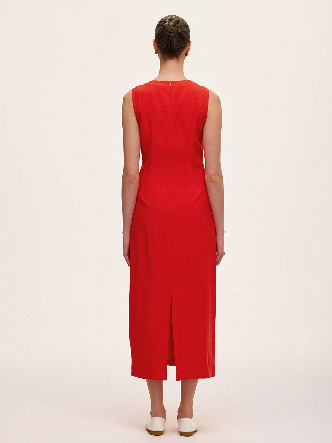 This playful bodycon dress combines elegance with casual charm. Featuring a simple round neck and button-down front, it’s accented with delicate ruffle details that add a flirty touch. Perfect for day-to-night wear, it hugs your silhouette while keeping things fun and feminine.