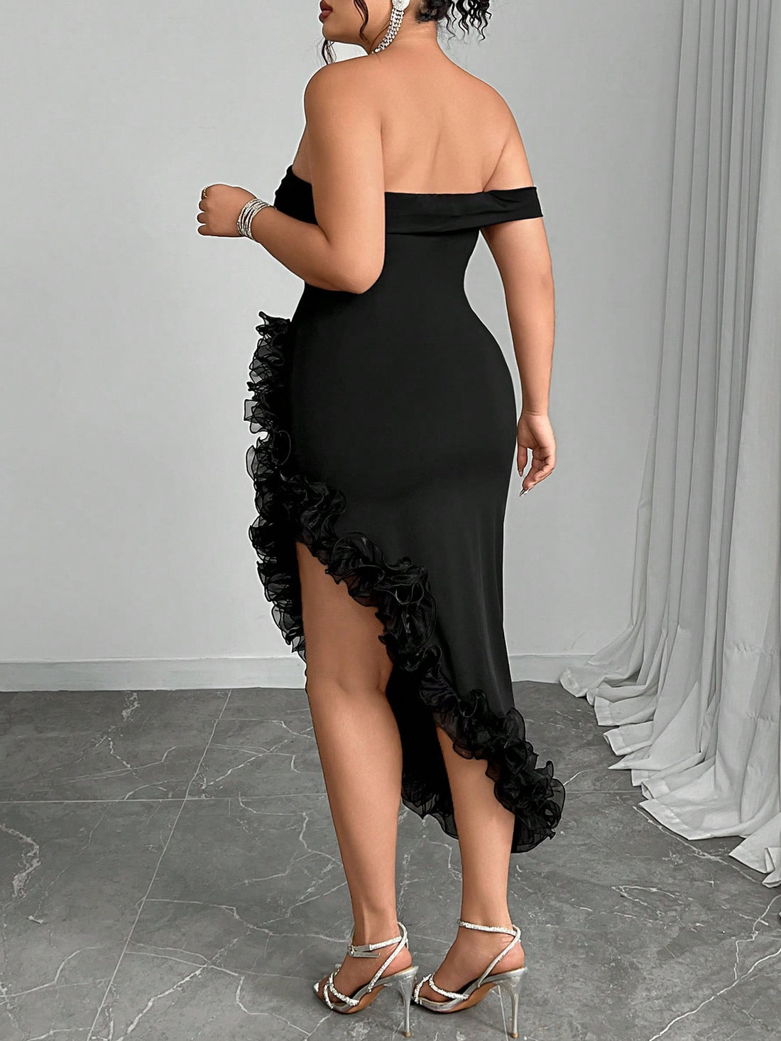 Turn heads at every event with this Elegant Plus Size Off-Shoulder Dress, designed to flatter your curves and celebrate your style. Its playful asymmetrical ruffled hem adds a fun twist to formal elegance, while the off-shoulder cut keeps things flirty and fresh. Perfect for special occasions where you want to shine and feel confident all night long.