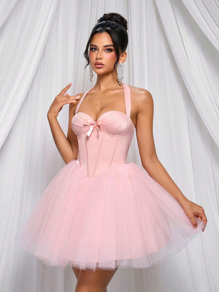 Elevate your event wardrobe with this stunning pink satin halter neck dress. The luxurious satin fabric drapes beautifully, creating an elegant silhouette that turns heads at music festivals, parties, and graduation celebrations. The halter neckline offers a flattering, sophisticated look while the flowing design ensures comfort throughout the night. Whether you're dancing under the stars or posing for photos, this dress delivers timeless style and confidence.