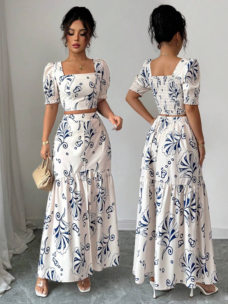 Bloom into effortless style with this charming 2-piece set! The short-sleeve floral shirt pairs perfectly with a graceful slit-hem skirt, creating a look that's equal parts vacation-ready and everyday fabulous. Whether you're sipping cocktails by the pool or running errands around town, this set delivers comfort and elegance in one gorgeous package. The vibrant floral print brings a fresh, feminine touch that works year-round. Mix, match, or wear together—this versatile duo is your new go-to for looking put