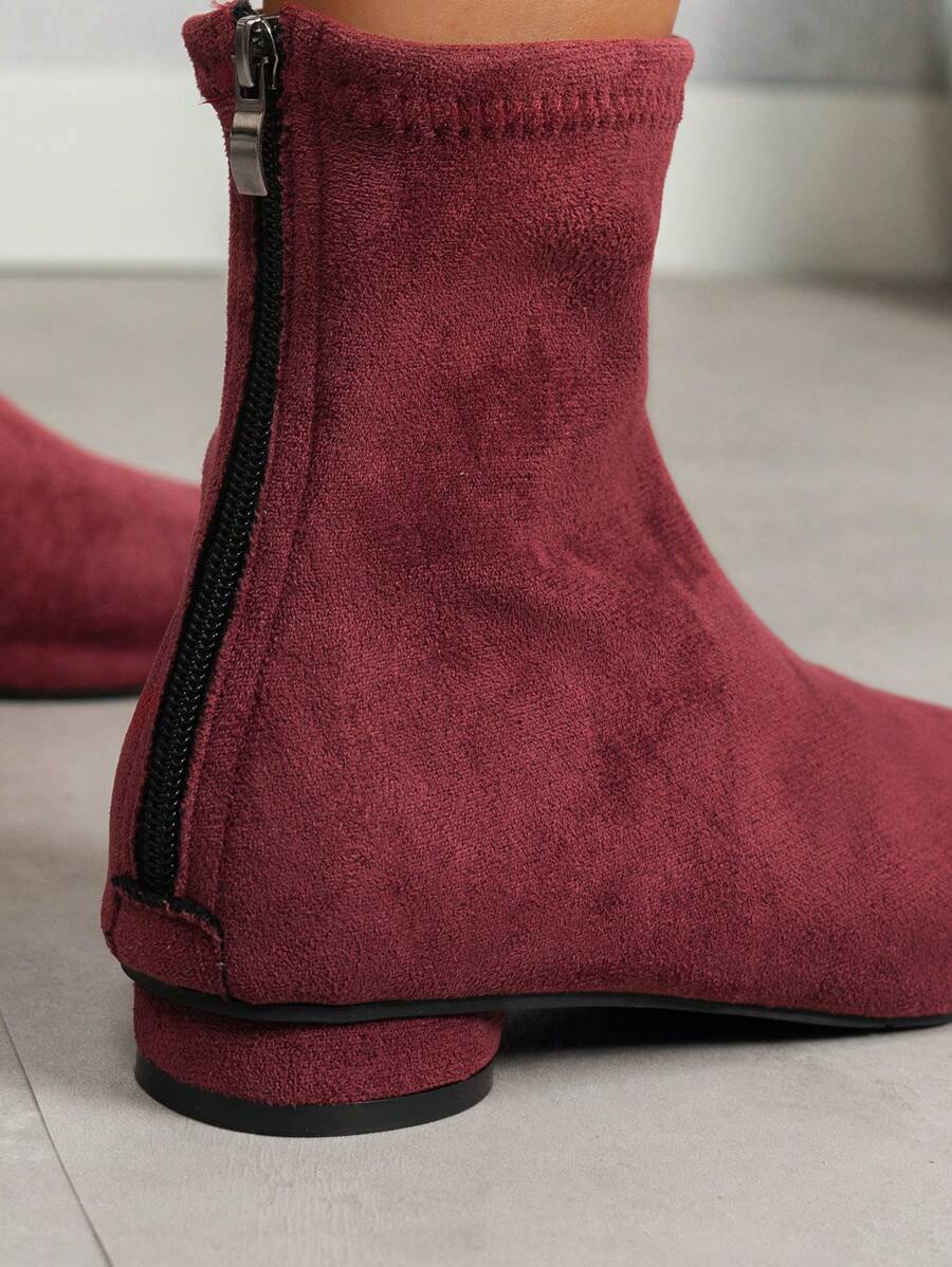 Step out in style with these chic women's ankle boots featuring trendy chunky heels that boost both confidence and comfort. Perfect for every season, they effortlessly elevate any outfit while keeping your feet cozy for all-day wear. Whether paired with jeans or dresses, these boots add a playful edge to your wardrobe essentials.