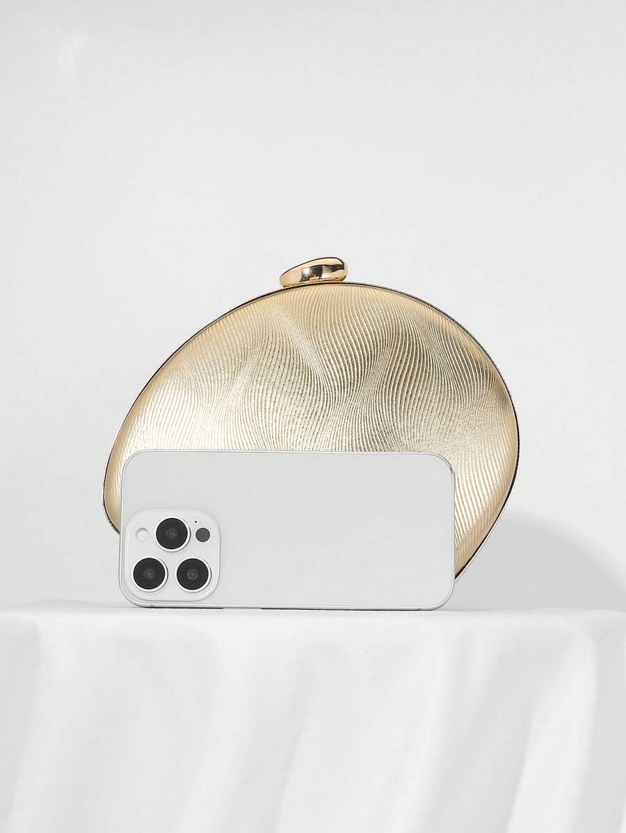 Add a touch of sparkle to your special night with this Elegant Gold Ripple Design Evening Clutch. Perfect for weddings and formal events, its shimmering gold finish and ripple pattern catch the light beautifully, making it a fun and stylish companion for your essentials. Compact yet roomy enough for your must-haves, this clutch turns heads while keeping your hands free to dance the night away.