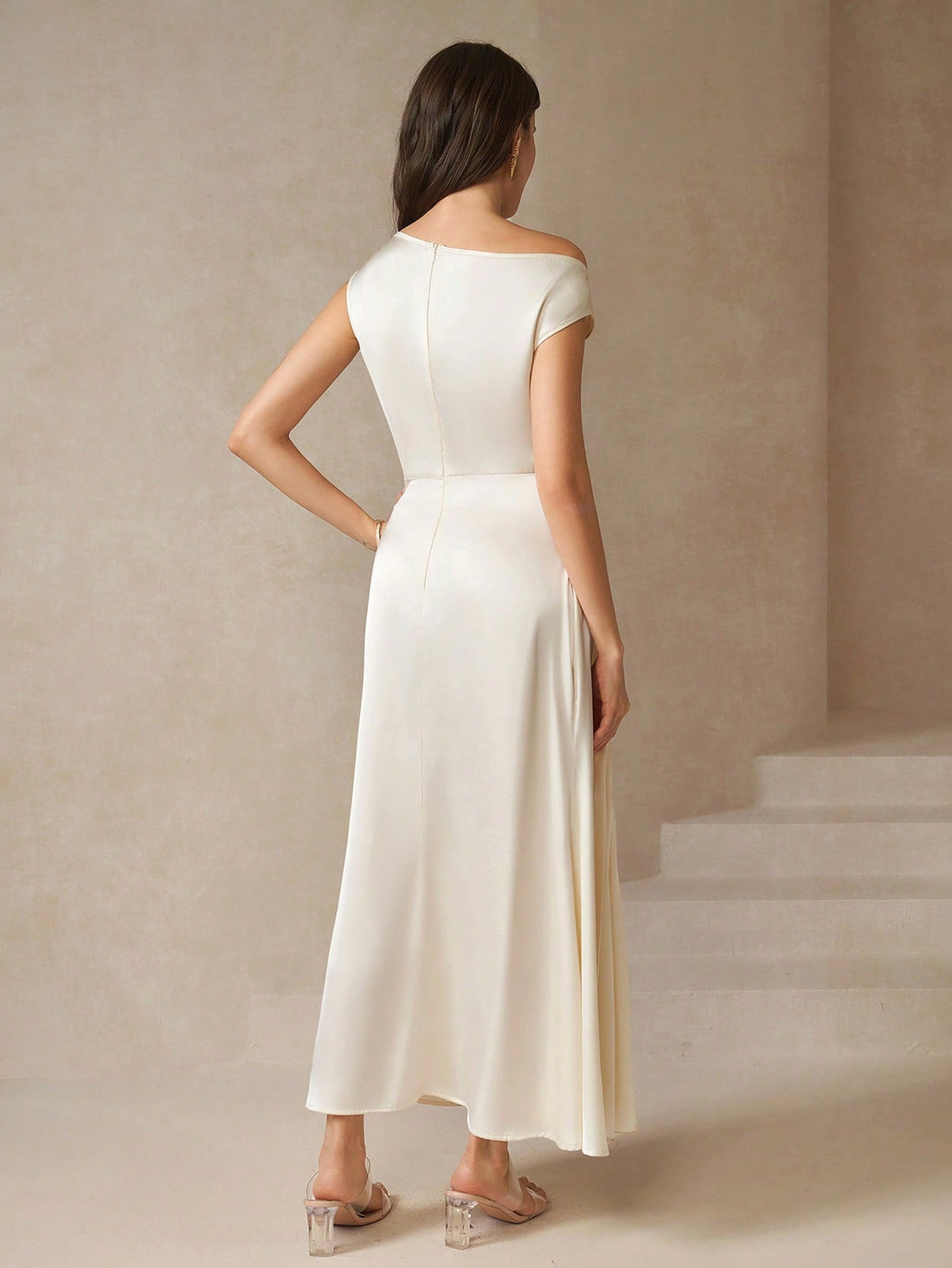 Step into the spotlight with this Elegant Asymmetric Pleated Ruched Dress—your perfect summer wedding or special occasion companion. Playful pleats dance across the silhouette, while the ruched details add a flirty touch. The asymmetric design keeps things fresh and fun, ensuring you turn heads wherever you go. Lightweight and breezy, it’s made to move with you from the ceremony to the dance floor with effortless charm.