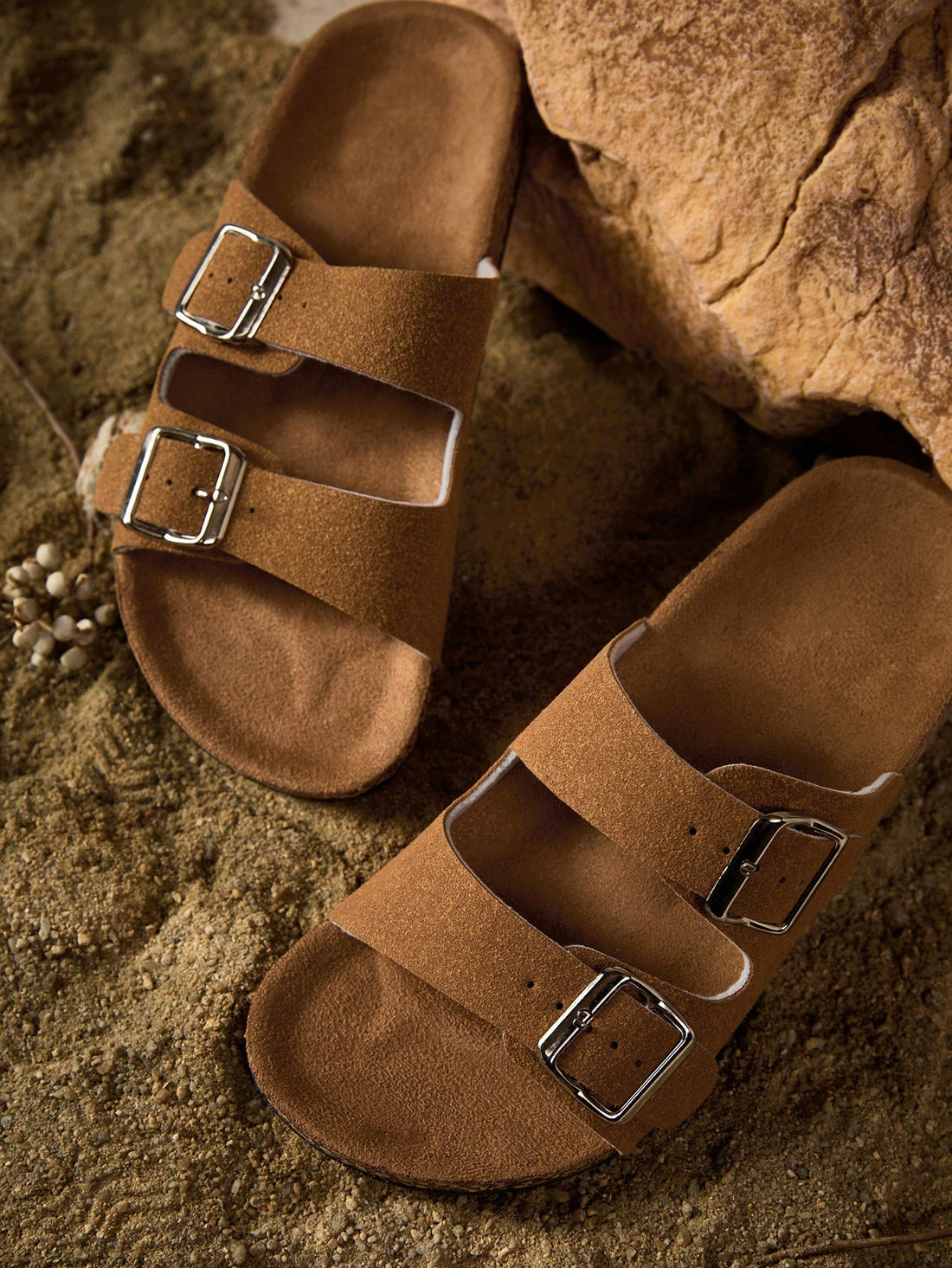 Step into summer with Tropiscape Buckled Flat Slippers! These beach-ready sandals bring style and comfort to your sunny adventures. With a playful design and secure buckle, they'll keep you strutting confidently from boardwalk to beach bar. Perfect for both guys and gals who want to look cool while keeping their toes happy!