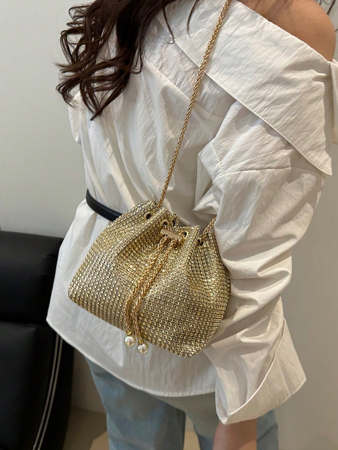This adorable mini bucket bag is your new go-to accessory for every adventure! Featuring a sleek crossbody design with a stylish chain strap, it's the perfect blend of function and fashion. Whether you're heading to the office, campus, or a casual outing, this versatile bag keeps your essentials organized and within reach. The compact size doesn't compromise on style—it's the ideal companion for anyone who refuses to sacrifice flair for practicality. Elevate your everyday look with this chic, must-have piec