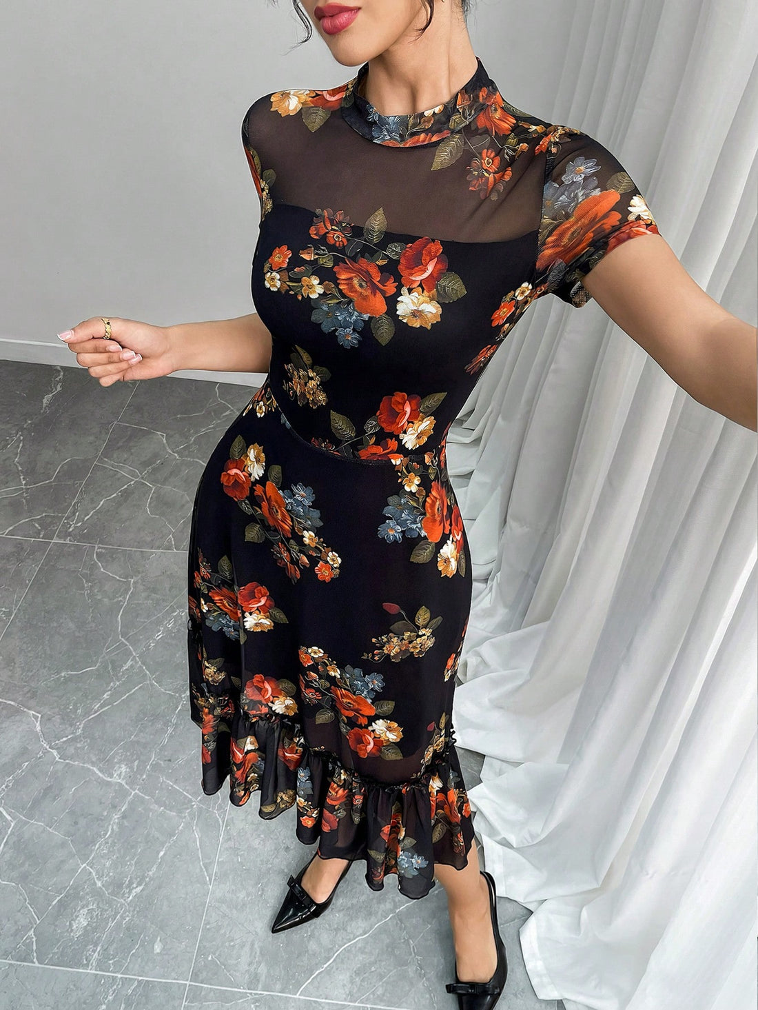 Embrace yourEmbrace your dark romantic side with this stunning gothic floral midi dress that's equal parts mysterious and mesmerizing. The cinched waist creates a flattering silhouette that celebrates your curves, while the enchanting wave hem adds movement and drama to every step. Perfect for those who dare to blend elegance with edge, this dress transforms any occasion into a gothic fairy tale moment. Whether you're channeling Victorian vibes or modern witchy chic, this piece proves that darkness has neve