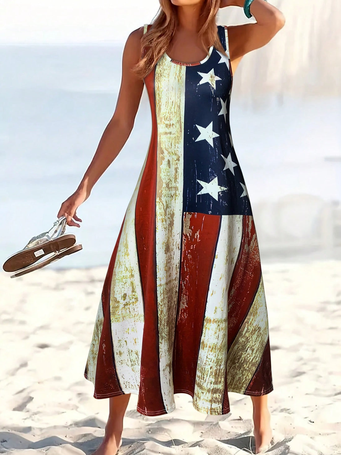 Celebrate summer in style with this trendy women's long tank dress featuring a bold American flag print. Its lightweight, flowy design keeps you cool and comfortable whether you're lounging on vacation or out and about daily. Easy to dress up or down, this playful piece adds a patriotic pop to your wardrobe while letting you move freely all day long. Perfect for sunny days and star-spangled nights!