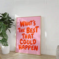 Framed pink quote poster with orange lettering styled beside plants