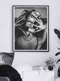 Black and white money portrait displayed above a modern console