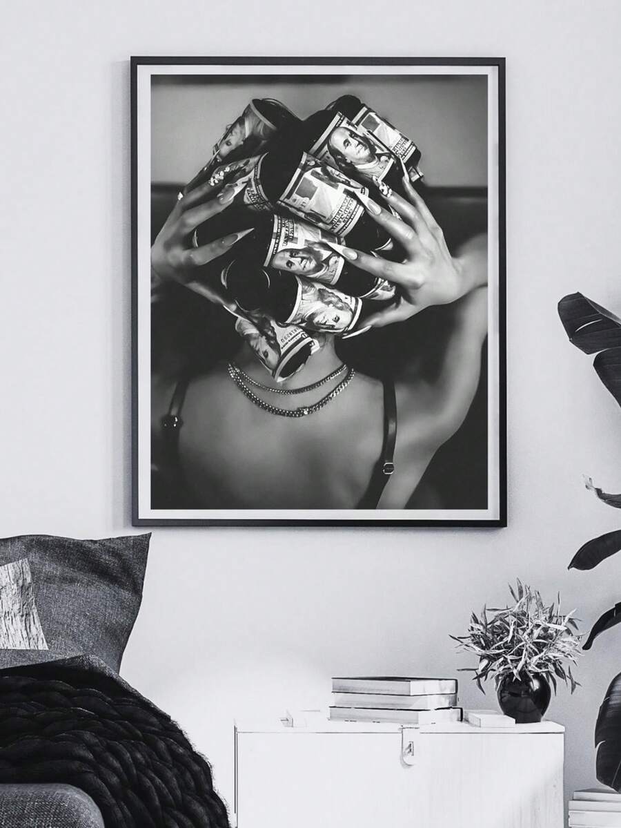 Black and white money portrait displayed above a modern console