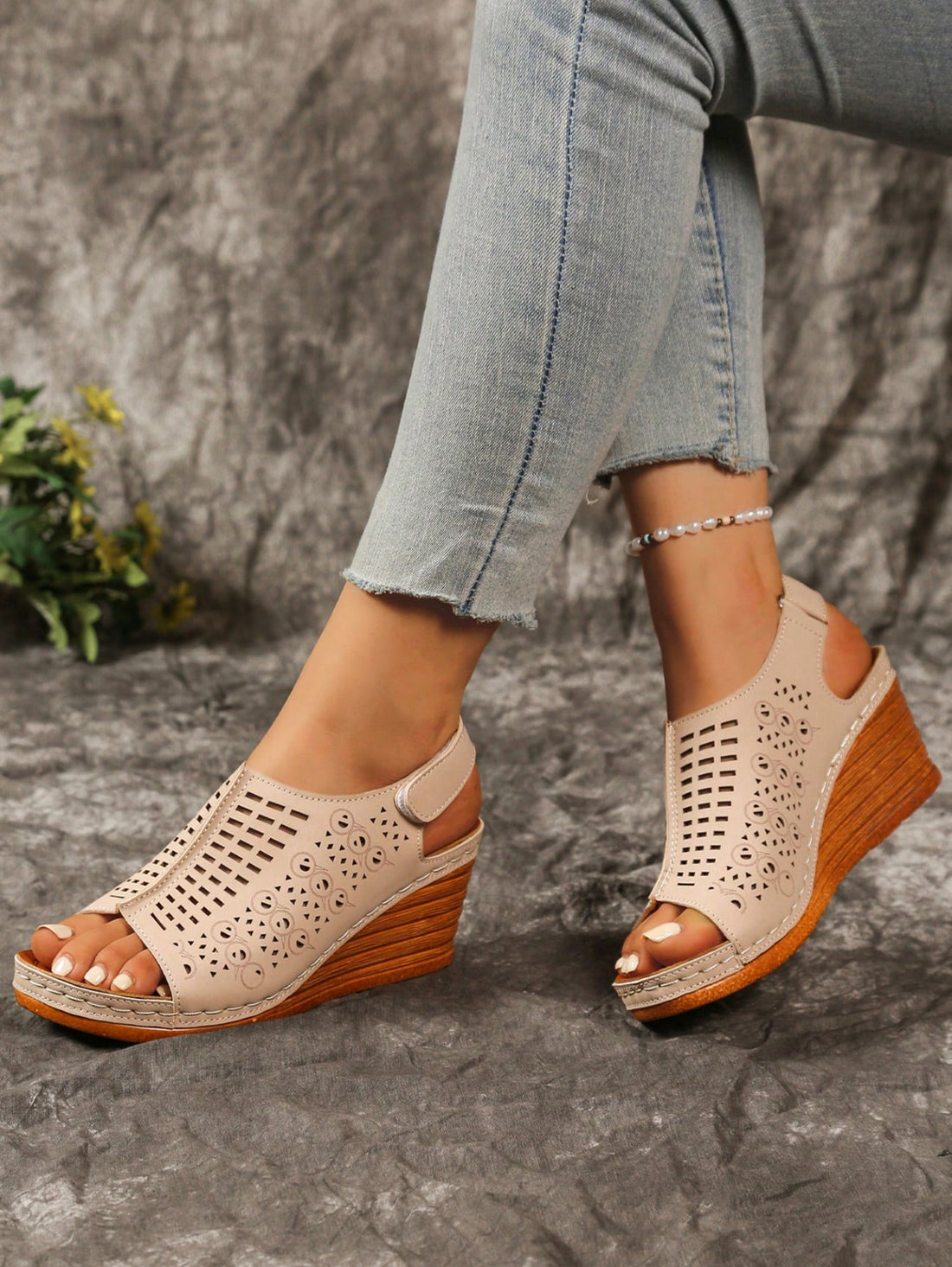 Step into summer with our playful Chic Summer Wedge Heel Sandals! These women's sandals feature an eye-catching cutout floral design that adds a touch of whimsy to any outfit. The comfortable wedge heel gives you height without sacrificing stability, making these the perfect companions for beach parties, outdoor brunches, or evening strolls. Your feet will thank you for choosing style that doesn't compromise on comfort!