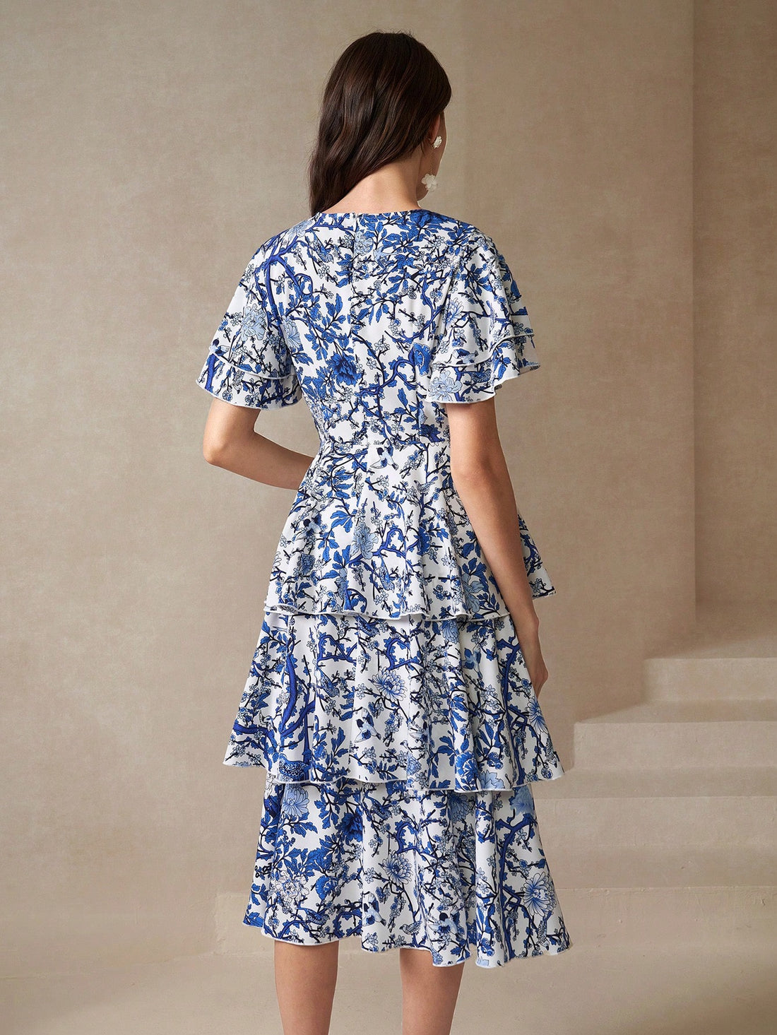 Step into sunshine with this Chic Floral Dress featuring fluttery butterfly sleeves and a playful layered hem. Its breezy design brings effortless style and a touch of whimsy to any day, making it your go-to for twirling through warm-weather adventures.