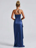 Navy satin gown back view showing crossed spaghetti straps and full-length skirt