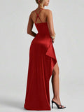 Red satin gown front view styled with long gloves, side drape and high slit