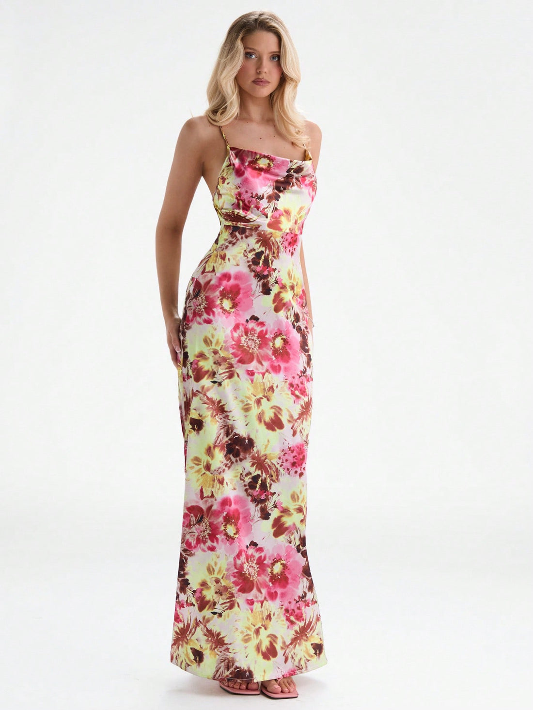 Slip into effortless elegance with this stunning floral satin dress that's ready for anything. The delicate print brings romance to every moment, while the chic hollow back tie adds just the right amount of flirtation—whether you're heading out for a candlelit dinner or packing for a breezy getaway. Smooth satin drapes beautifully against your skin, creating a silhouette that feels as good as it looks. From intimate date nights to sun-soaked vacations, this versatile piece is your new go-to for looking poli