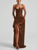 White satin gown back view showing crossed straps and long skirt