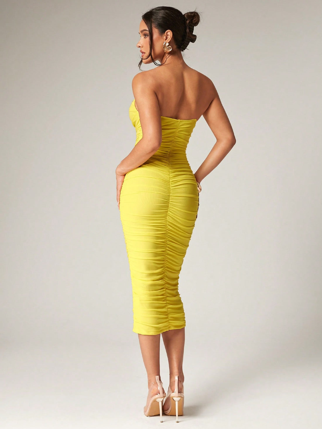 Step out in style with this Elegant Herringbone Pleated Mesh Bodycon Dress in a sunny cream yellow. Its playful herringbone pleats hug your curves perfectly, making it the ideal choice for romantic dates or dreamy summer vacations. The light, breathable mesh keeps you cool while turning heads, whether you’re strolling seaside or dancing under the stars. Effortless charm and flattering fit come together in this midi dress designed to make every moment feel special.