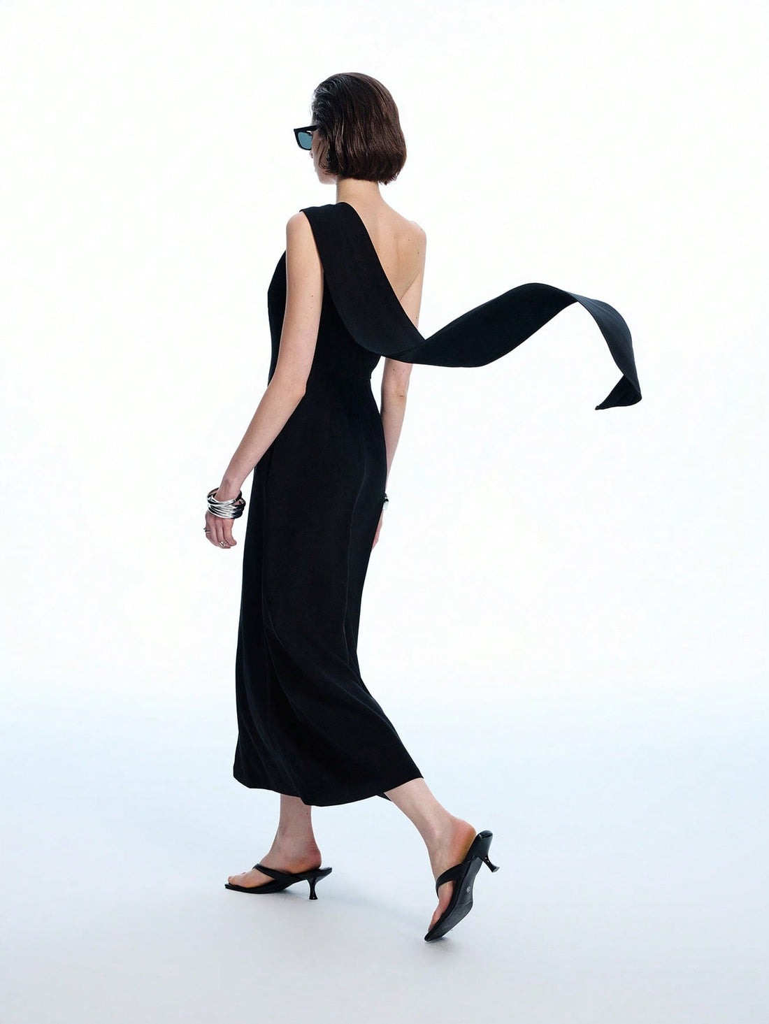 Step into the spotlight with this chic one-shoulder A-line midi dress, designed to turn heads at any spring or summer event. Its flattering silhouette dances with every move, making it the perfect pick for prom nights or elegant gatherings. Light, breezy, and effortlessly stylish, this dress promises to keep you comfortable while stealing the show. Ready to make memories? This dress is your new best friend.