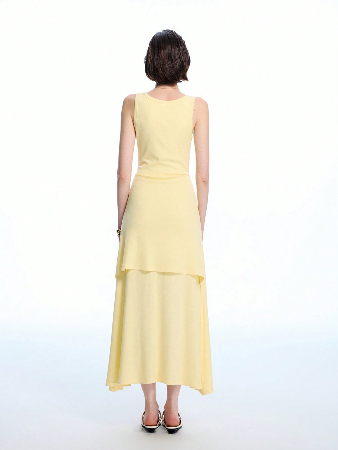Step into effortless style with this minimalist U-neck two-piece long dress, designed to keep you cool and chic all spring and summer. Its breezy silhouette and flattering neckline make it perfect for casual outings or sunny strolls. Mix and match or wear together for a fresh, playful look that elevates your everyday wardrobe.