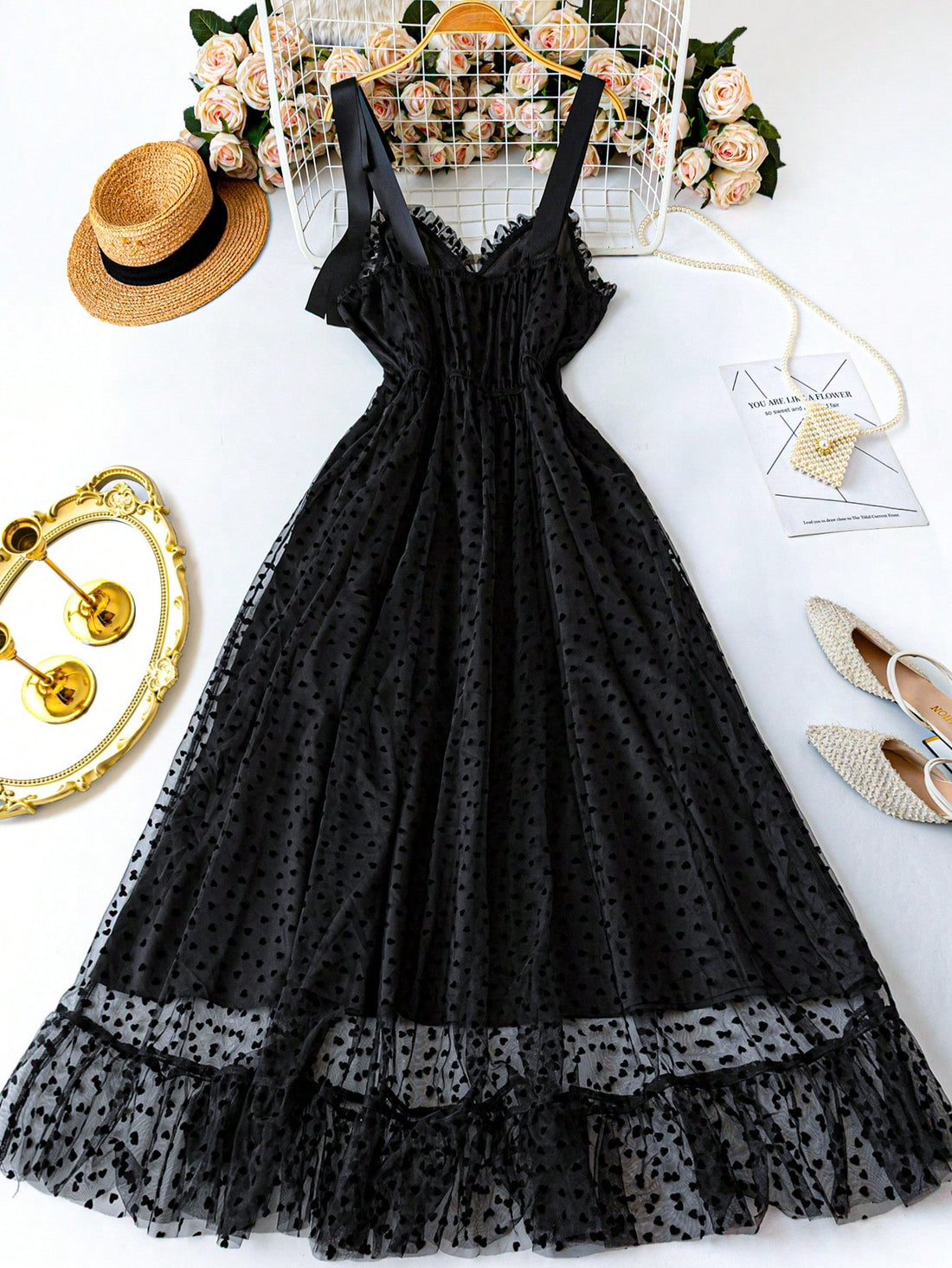 Flatter your curves with this elegant plus-size black dress designed to make every moment feel romantic. Its versatile style effortlessly transitions from casual brunches to evening soirées, ensuring you look fabulous wherever you go. Slip into comfort and confidence with a dress that celebrates you, adding a touch of playful charm to your wardrobe for any occasion.