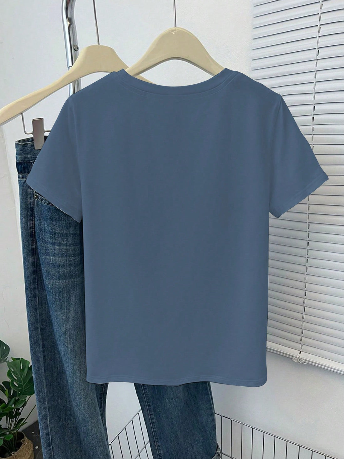 Celebrate summer in style with this playful embroidered American flag T-shirt, perfect for July 4th festivities and backyard BBQs. Its vibrant design adds a fun patriotic flair to your casual look, making every gathering feel extra special. Comfortable and eye-catching, it’s your go-to tee for sunny days and star-spangled nights.