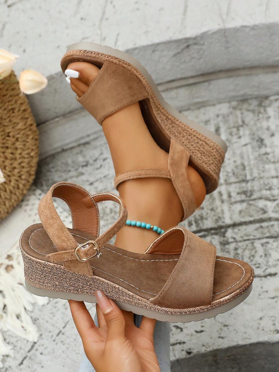 Step into summer with these chic one-strap wedge heel sandals, perfect for your bohemian holiday vibe. Their stylish design adds a playful touch to any outfit while offering comfortable height for all-day adventures. Whether you're strolling the beach or dancing at sunset, these sandals bring effortless charm to your warm-weather wardrobe.