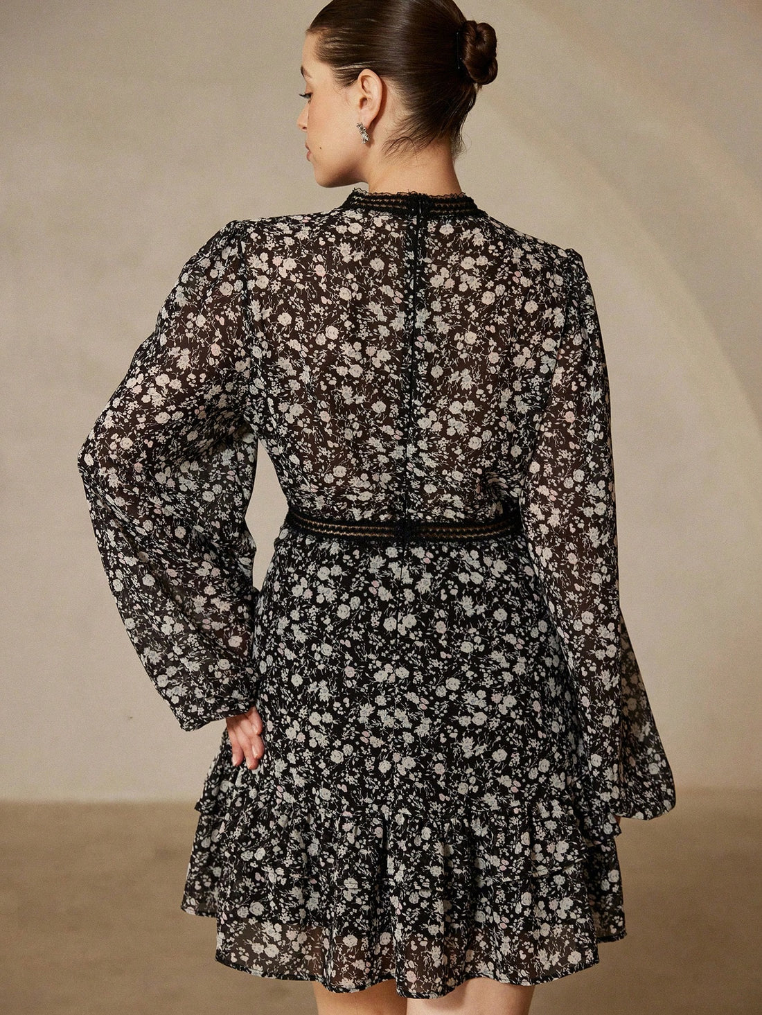 Twirl into autumn with this charming plus-size mini dress that celebrates vintage flair with modern comfort. Adorned with delicate floral prints, it features romantic sheer chiffon puff sleeves that add a touch of whimsy and dimension. The cinched waist with belt detail creates a flattering silhouette while keeping things effortlessly chic. Perfect for brunch dates, casual outings, or whenever you want to feel fabulous in your own skin. This dress proves that timeless style has no size limit.