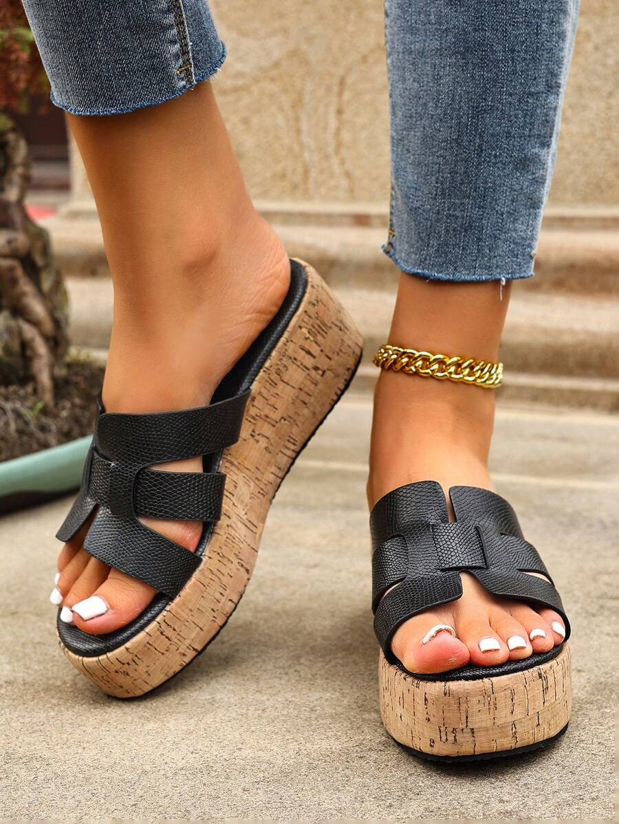 Step into sunshine-ready style with these Bohemian Platform Wedge Sandals! Perfect slip-ons for beach days or casual strolls, they blend comfort with a splash of boho flair. Available in black, brown, and white, these wedges add a fun lift to your summer outfit while keeping you effortlessly chic. Whether sandy shores or city streets, these sandals bring playful vibes wherever you go.