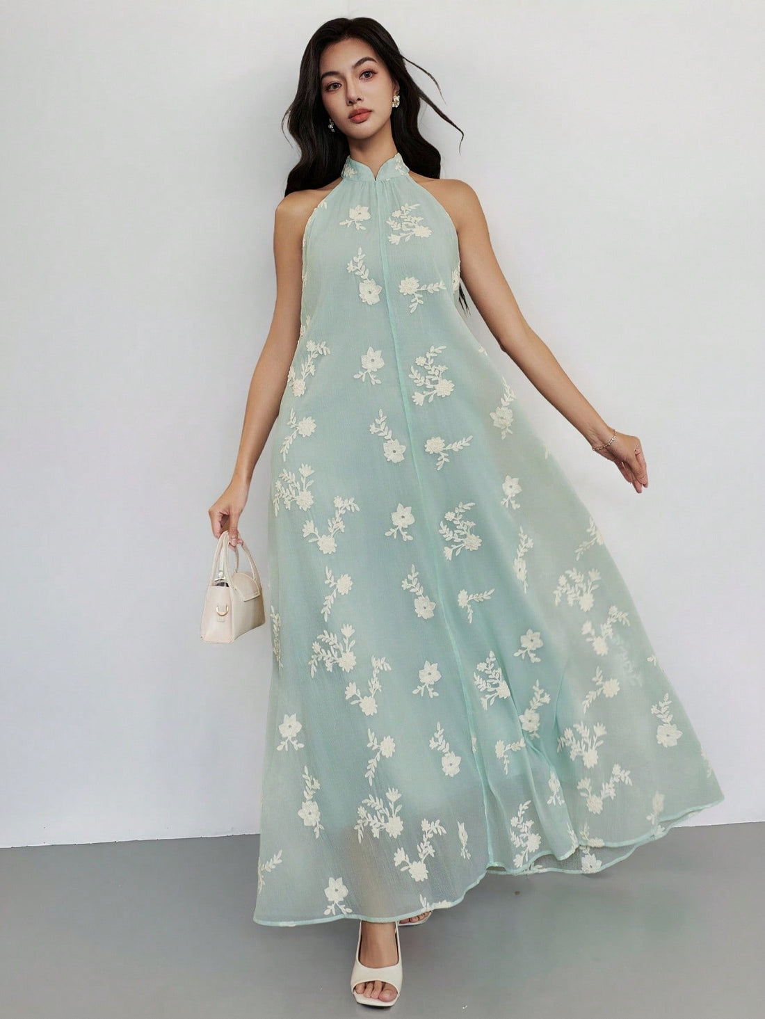 This sleeveless summer dress brings the party with its gorgeous floral embroidery! Perfect for graduation celebrations or casual warm-weather adventures, it's the outfit that says "I woke up like this" while secretly being your fashion MVP. Slip it on and watch heads turn as you float through summer days with effortless style and a dash of elegance.