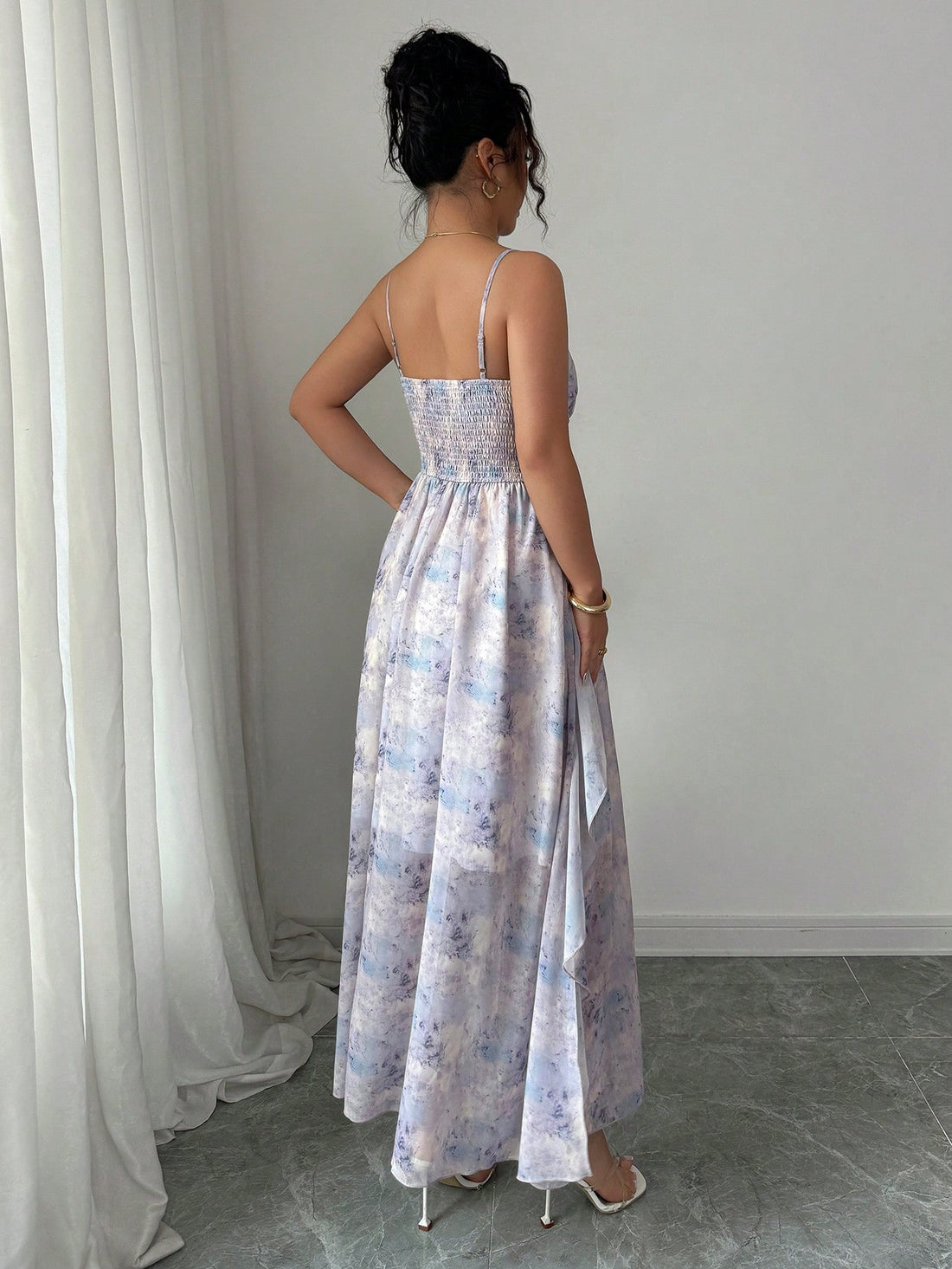 Make a splash this season in our eye-catching asymmetrical tie-dye dress! Featuring a flattering drawstring waist that lets you customize your fit, this breezy number is your new go-to for beach days and warm-weather adventures. The vibrant tie-dye pattern brings instant personality to any outfit, while the relaxed silhouette keeps you cool and comfortable. Whether you're strolling the boardwalk or catching sunset drinks with friends, this dress delivers effortless style that turns heads. Throw it on over a