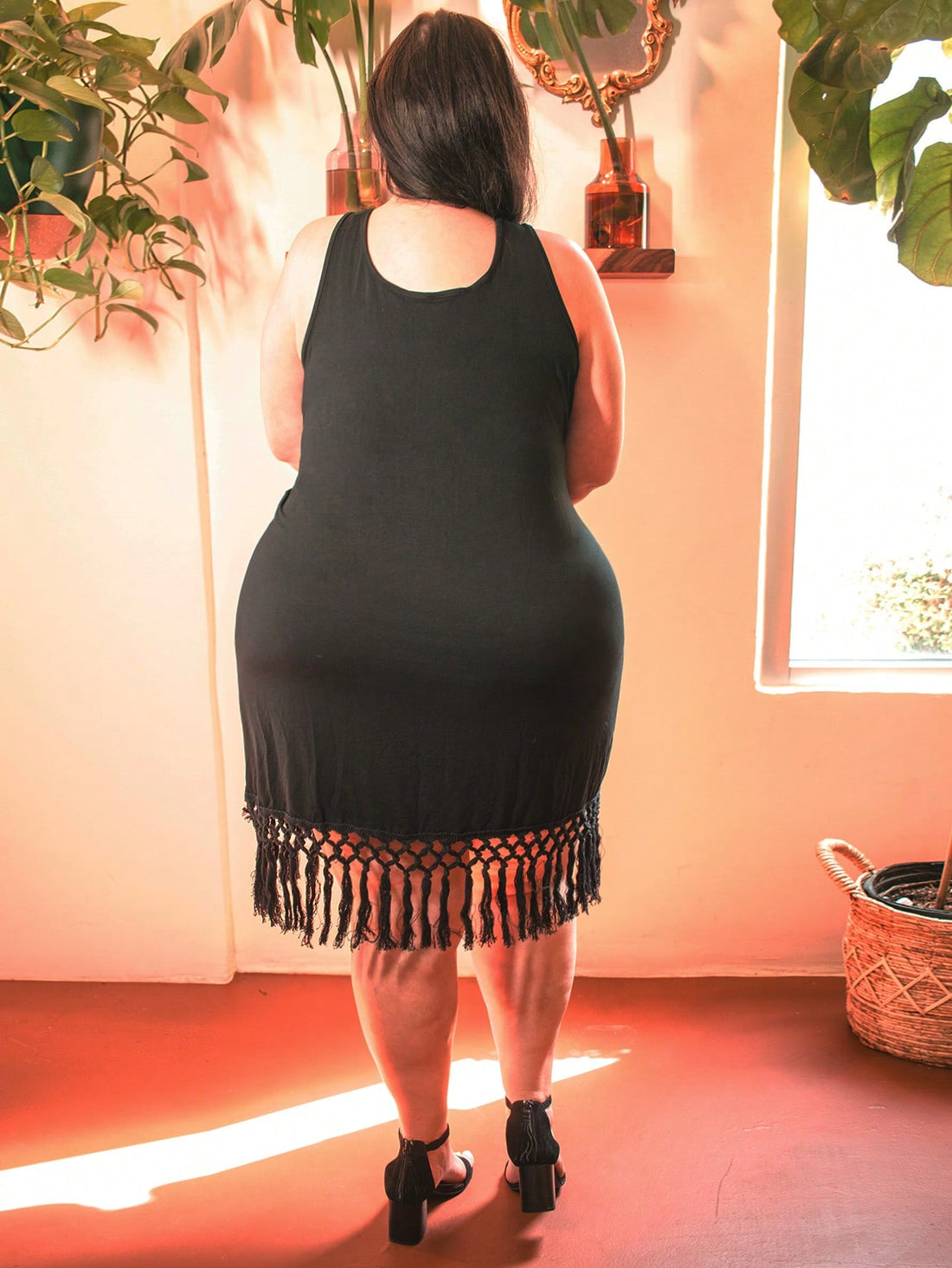 Escape to your own tropical paradise in this effortlessly chic boho beach dress! Designed for curves and comfort, this sleeveless sundress features playful fringe detailing that dances with every breeze. The solid color keeps things timeless while the relaxed silhouette lets you move freely—perfect for beach strolls, seaside dinners, or lazy holiday afternoons. Slip it on and feel the carefree vibes instantly. Your summer just got a whole lot more fabulous!