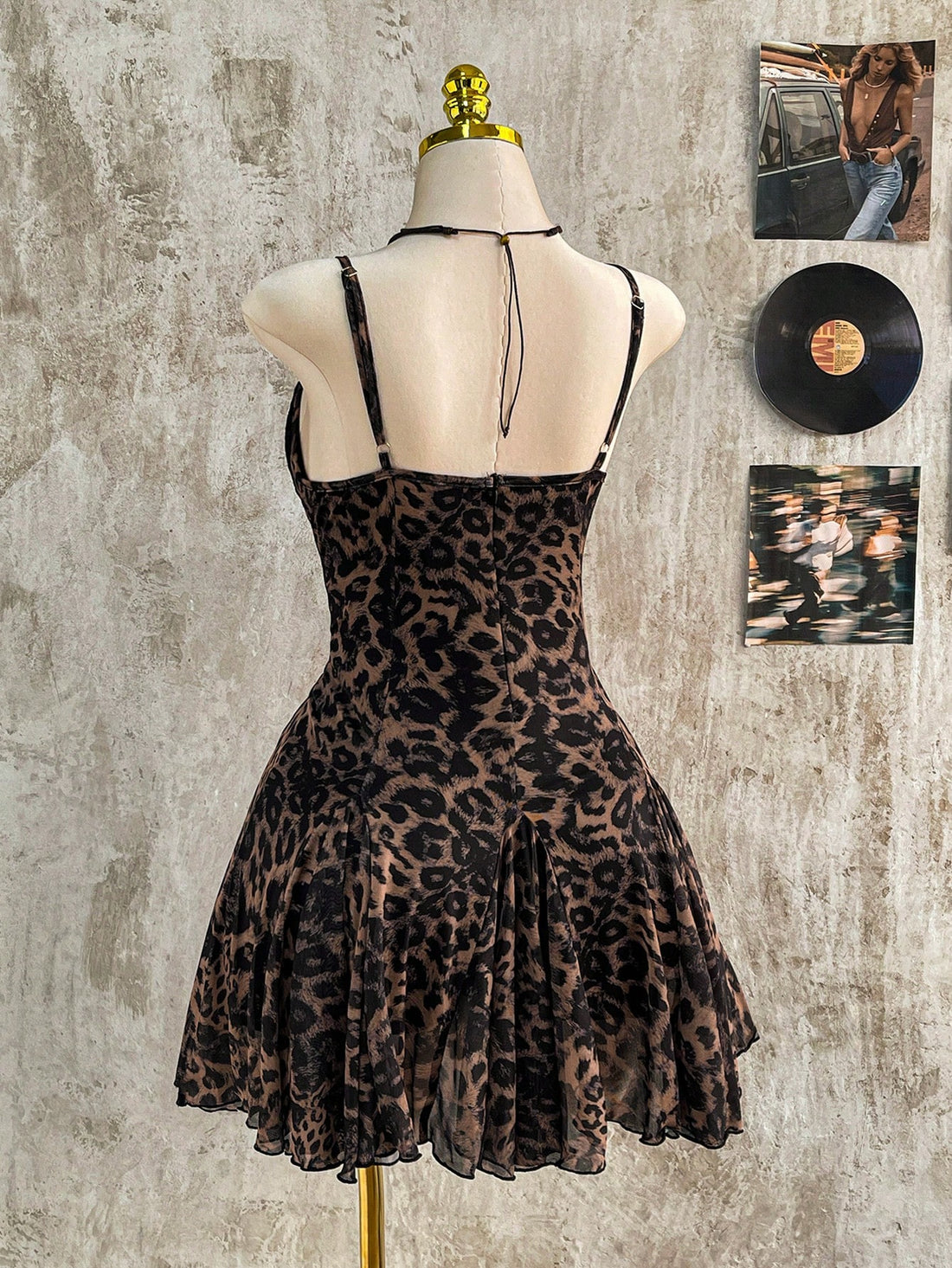 Embrace your curves in this fabulous plus-size leopard print dress! The delicate spaghetti straps offer a flirty, feminine touch while the vintage-inspired pattern adds instant personality to your wardrobe. Thoughtfully designed for pear-shaped figures, this dress flatters where it counts and moves with you all day long. Whether you're grabbing coffee, hitting the farmers market, or enjoying a casual lunch date, this versatile piece transitions seamlessly from day to night. Slip it on and let your style roa
