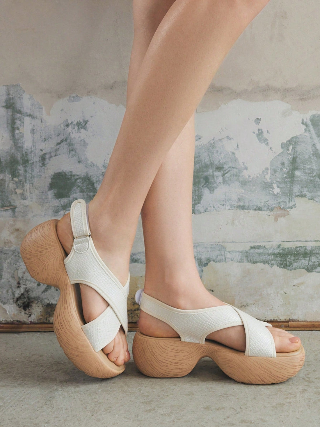 Step into bold style with these Chic Dark Punk Goth Summer Platform Wedge Sandals. Featuring open toes and edgy cross straps, these slip-on slippers blend comfort with a rebellious vibe. Perfect for adding a playful twist to your summer look while giving you a confident lift with their platform wedge design.