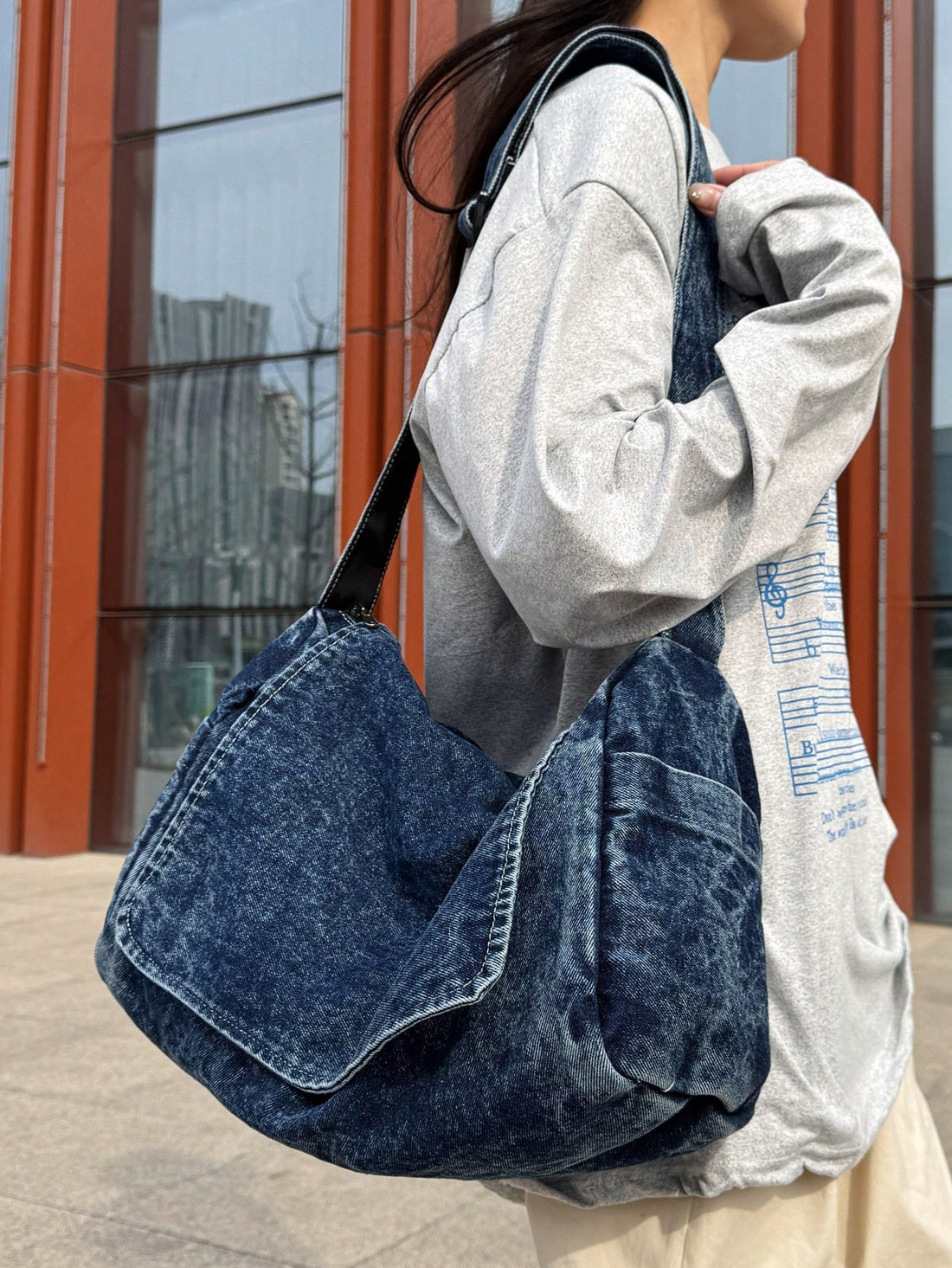 Crafted from durable canvas with intentional distressing for authentic vintage character, this spacious tote seamlessly transitions from classroom to weekend outings. The generous interior accommodates textbooks, laptops, and daily essentials, while reinforced handles ensure reliable support for heavier loads. Its neutral blue palette pairs effortlessly with any wardrobe, making it an equally practical choice for students and professionals seeking understated style. The unisex design and versatile messenger