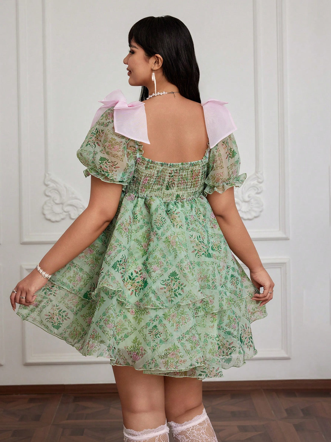 Step out in style with this playful plus-size dress featuring a vibrant floral print and charming ruffled short sleeves. Perfect for casual outings or relaxed gatherings, its flattering cut offers comfort and confidence all day long. Embrace effortless elegance with a fun, flirty twist!