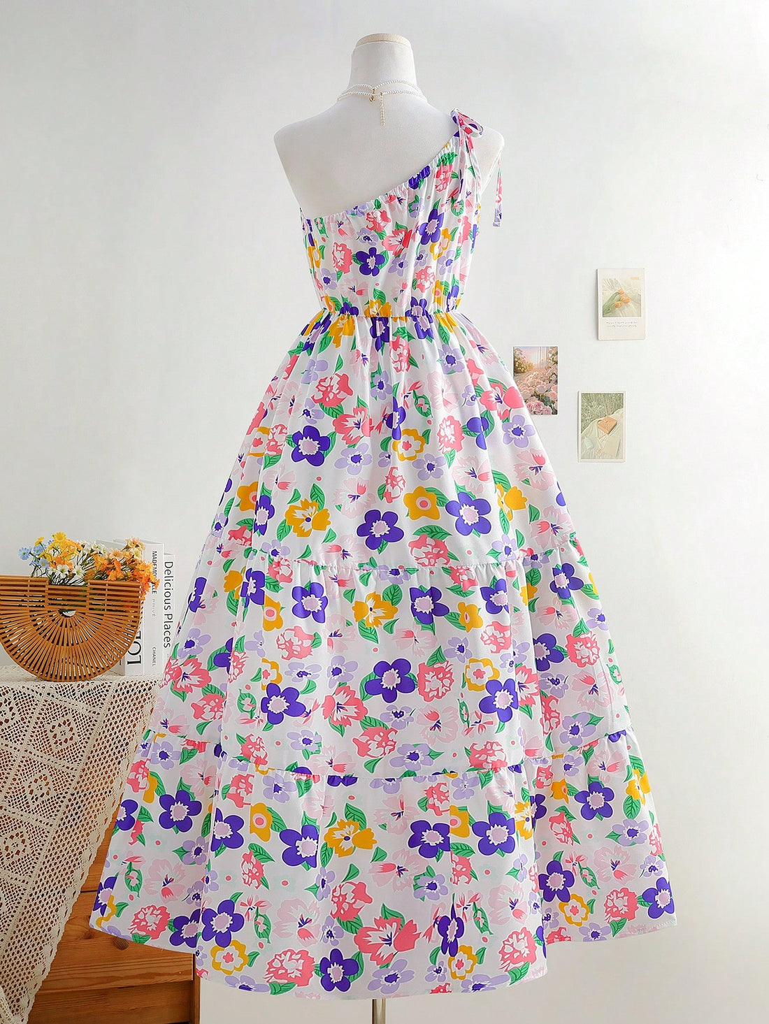 Step into sunshine with this playful ditsy floral dress, featuring a charming square collar and flirty puff sleeves. Perfect for breezy spring days or warm summer outings, it combines effortless style with a touch of whimsy to brighten your wardrobe and lift your mood.
