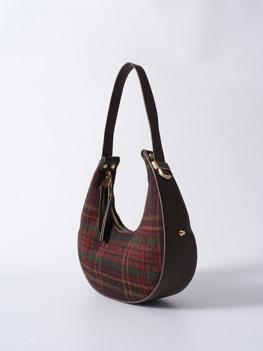 Add a pop of fun to your outfit with this Stylish Women's Colorblock Checkered Crescent Handbag in Coffee. Its playful colorblock design and crescent shape make it perfect for everyday adventures, while the roomy underarm tote style keeps your essentials close and hands free. Whether you’re running errands or meeting friends, this bag combines trendy vibes with practical charm.