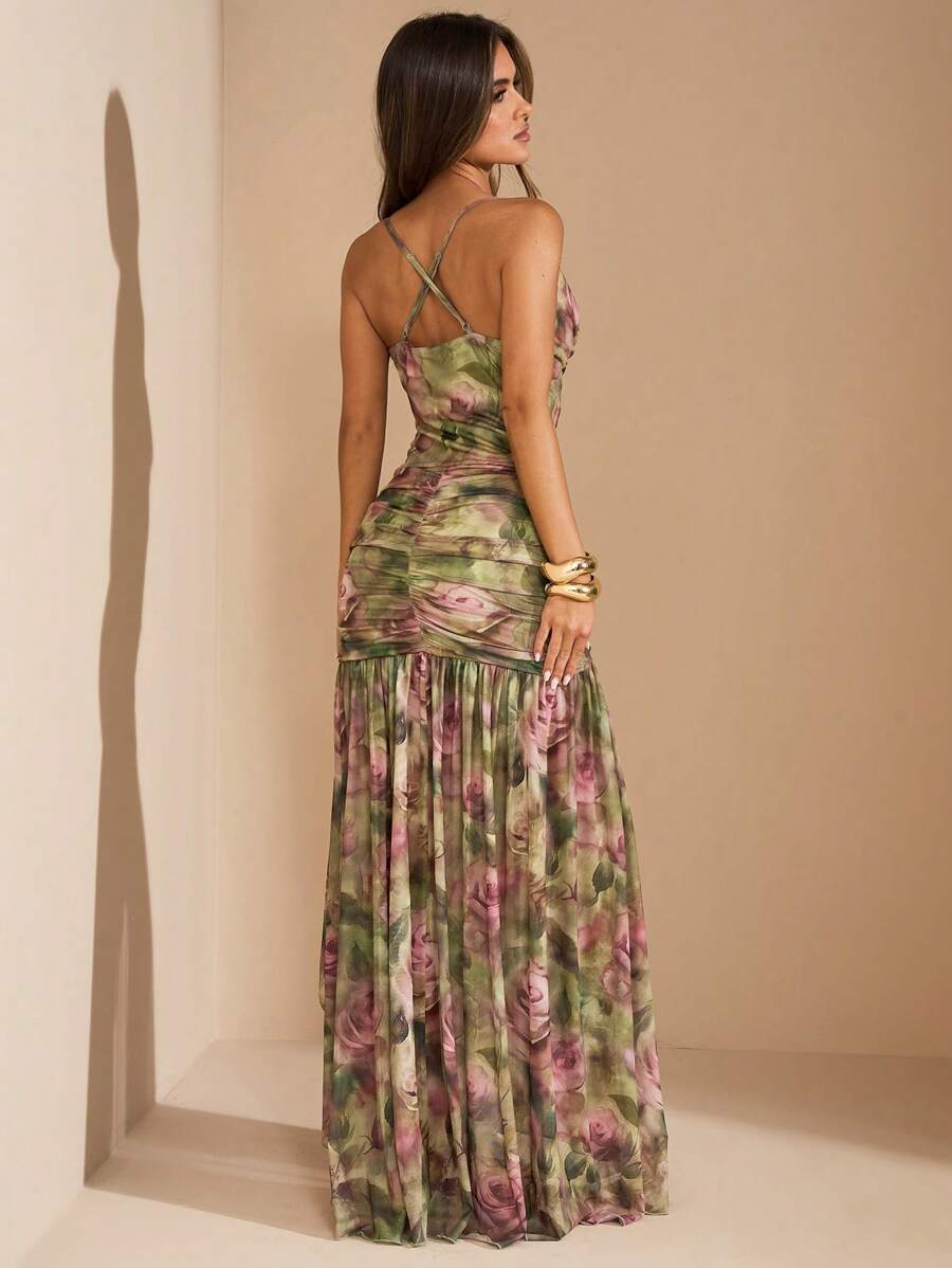 Back view floral maxi dress with crossed straps ruched hips and long sheer printed skirt