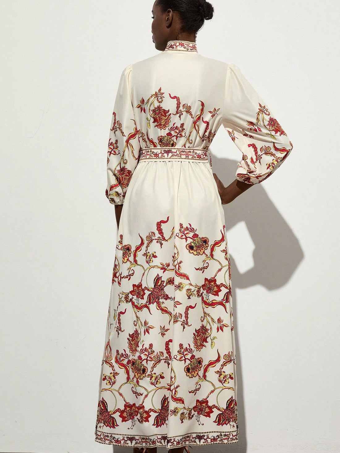 Step into summer with this playful fit and flare dress featuring a relaxed V-neck and charming puff sleeves. The vibrant floral print adds a burst of sunshine to your look, perfect for stylish getaways or casual days out. Its flattering silhouette moves with you, combining comfort and chic in one delightful package. Embrace effortless style and let your summer adventures bloom!