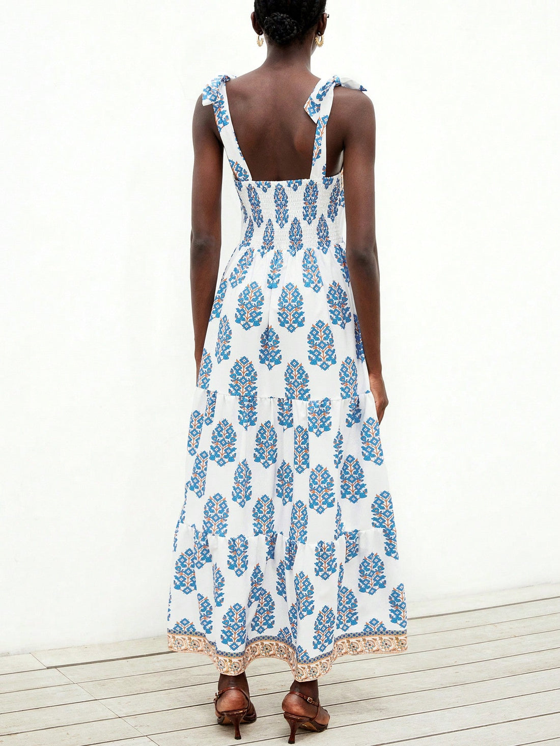 Step into effortless charm with this Elegant French Chic A-Line Dress. Featuring a delicate floral print and slender spaghetti straps, it’s perfect for turning heads on your next stylish getaway. Light, breezy, and flattering, this dress brings a playful touch of Parisian flair to your vacation wardrobe.