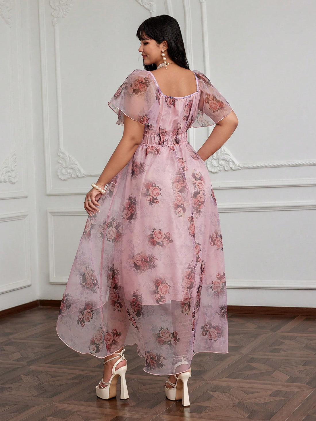 Step into romance with this playful plus size pink maxi dress, featuring a flattering sweetheart neckline and a charming floral print. Its flowing silhouette moves gracefully, perfect for twirling through sunny days or special evenings. Embrace elegance with a fun, flirty twist that celebrates your curves beautifully.