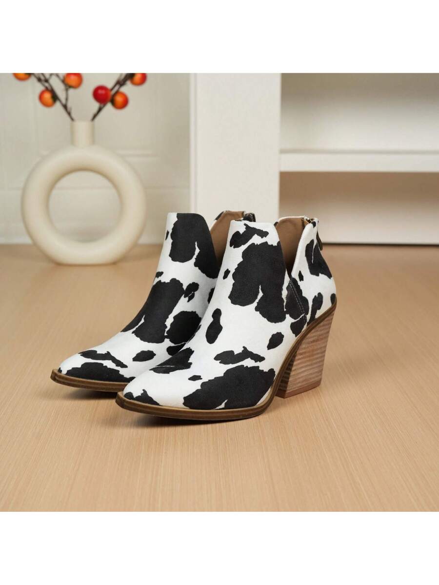 Step into bold style with these women’s western cowboy booties! Featuring a stacked leather heel and a playful V-cut ankle, they slip on easily for a hassle-free fit. Perfect for adding a dash of Western charm to any outfit, these boots blend fashion and comfort effortlessly. Whether you’re headed to a festival or just turning heads downtown, these booties bring a fun, flirty vibe to your wardrobe.