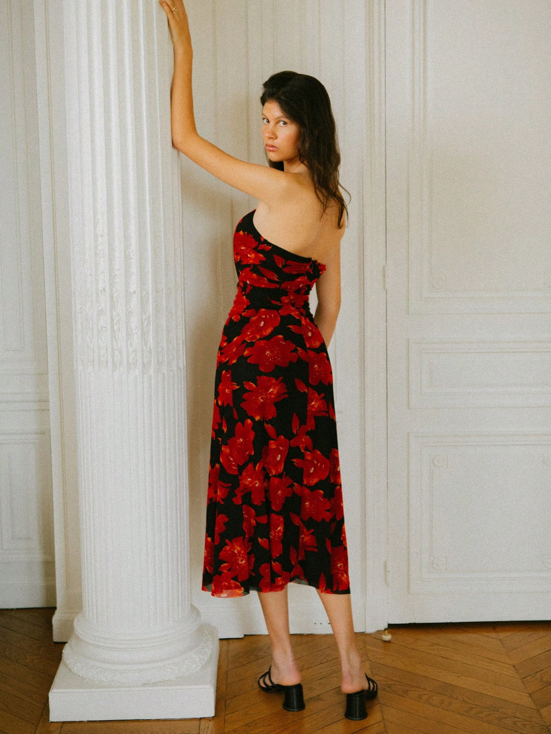 Turn heads in this stunning black midi dress featuring an elegant off-shoulder neckline and captivating red rose print. The flowing silhouette skims your curves beautifully, while the midi length offers sophisticated coverage that works for romantic date nights or wedding celebrations. Pair it with heels and statement jewelry for an unforgettable look that balances timeless elegance with modern flair. This versatile piece is your go-to for any occasion that calls for a touch of romance and style.