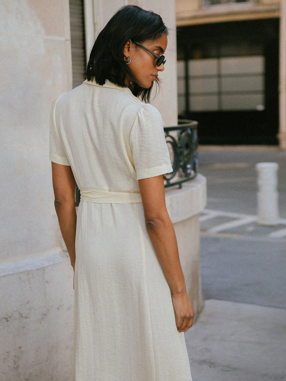 Sunshine meets sophistication in this delightful vintage-inspired midi dress! Featuring a cheerful yellow hue that brightens any day, this charming piece boasts a classic button-front closure and adjustable tie waist for a flattering silhouette. Whether you're heading to the office or embracing autumn's golden vibes, this dress transitions effortlessly from desk to dinner. The midi length offers timeless elegance while the playful color adds just the right amount of personality to your wardrobe. A versatile
