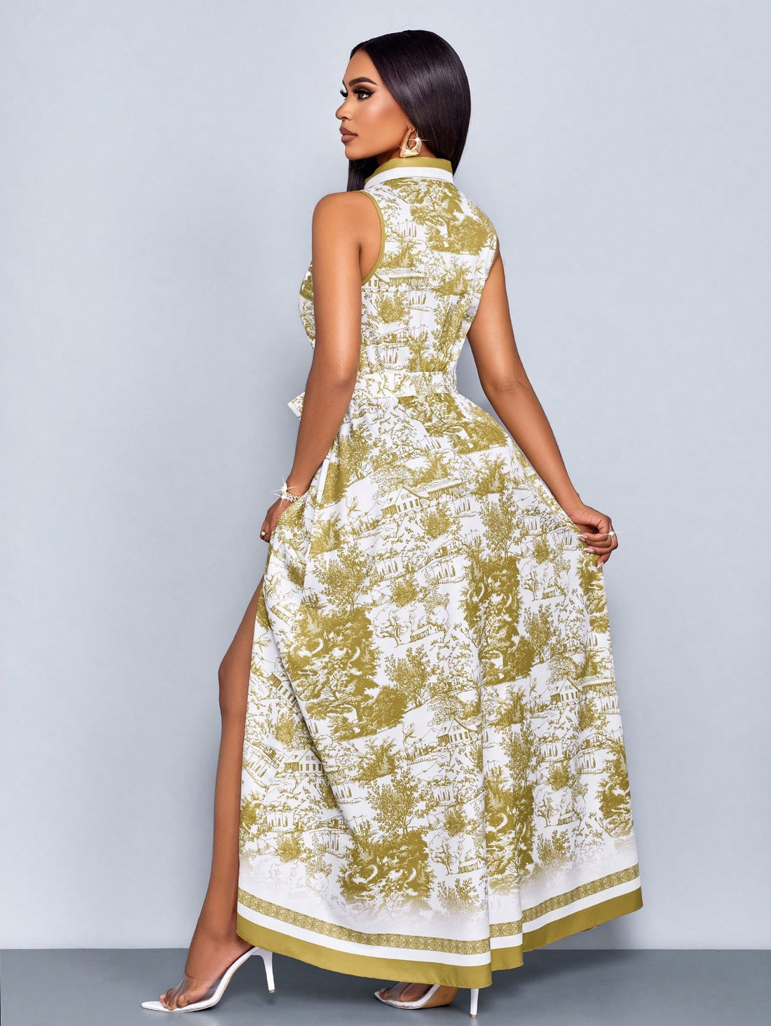 Step into vacation mode with this Elegant Floral Print Maxi Dress. Featuring a flattering fitted waist and a charming tie front, it effortlessly combines comfort and style. The flowing maxi length and vibrant floral pattern make it perfect for sunny days and breezy evenings. Whether you're strolling along the beach or enjoying a garden party, this dress adds a playful touch to your wardrobe.